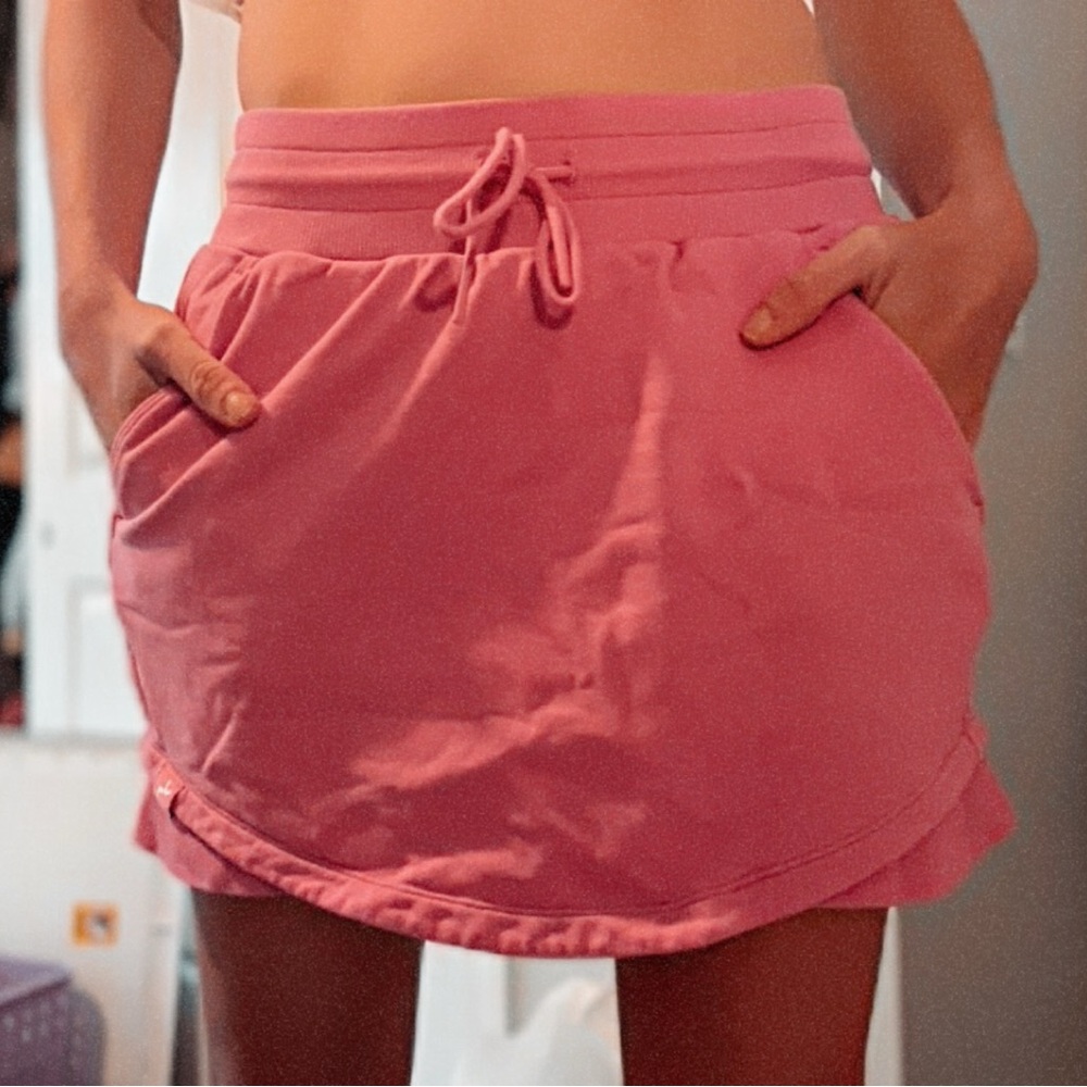 Pink tennis skort with pockets